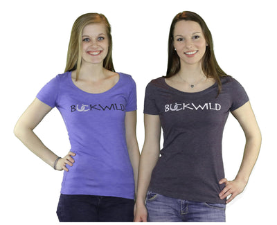 Two models wear women's scoop neck t-shirts with Buckwild logo front.  Back of shirt reads "If you can see this, put me back on my horse" written upside down. 